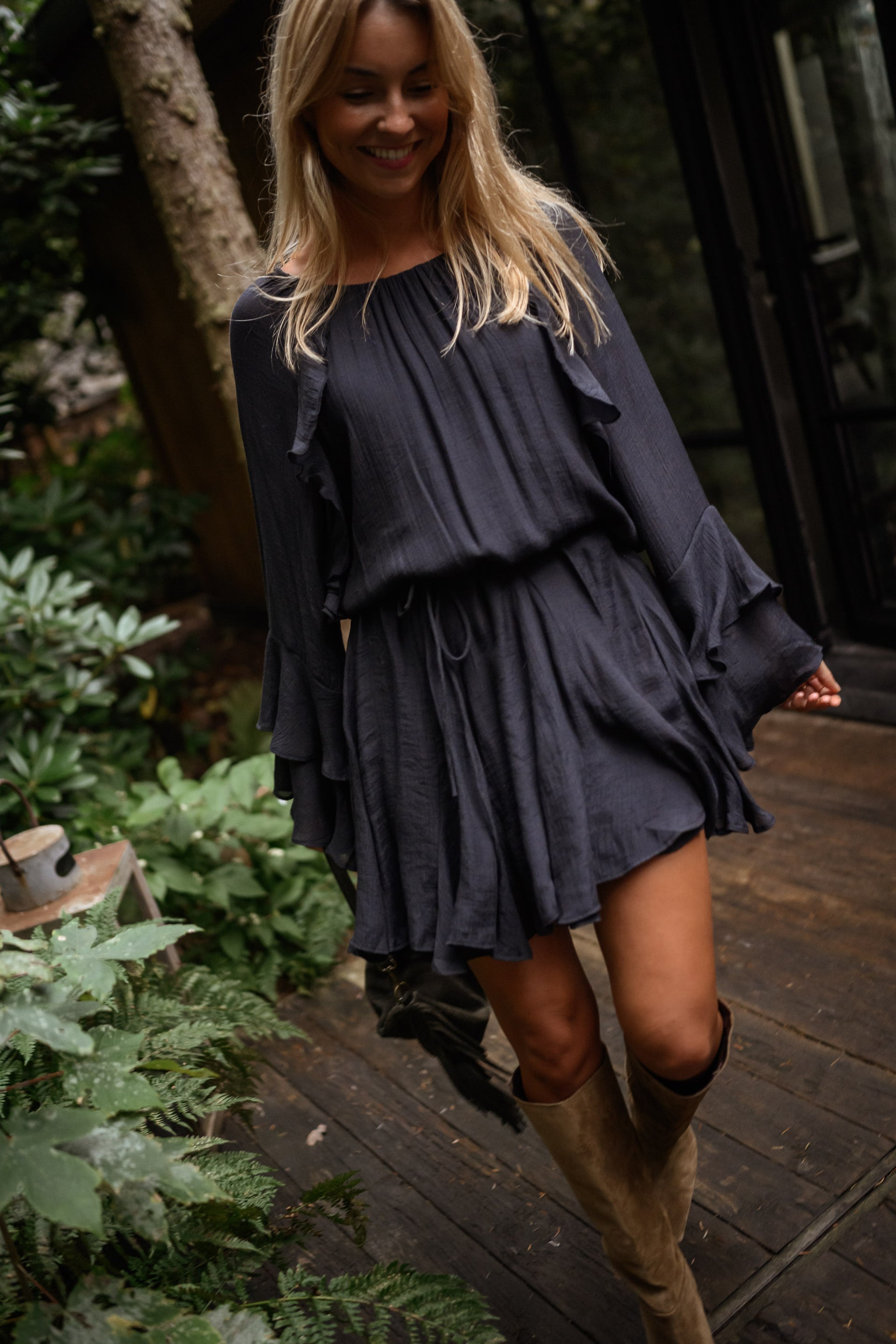 Black Ruffled Dress with Long Flared Sleeves, Drawstring Waist & Flowing Silhouette Audrina Dress by EASY CLOTHES Size M-L Black Ruffled Dress with Long Flared Sleeves, Drawstring Waist & Flowing Silhouette Audrina Dress by EASY CLOTHES Size M-L